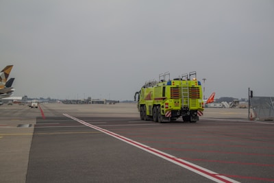 An emergency response drill at an international airport showcasing coordinated aircraft rescue efforts.