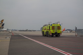 An emergency response drill at an international airport showcasing coordinated aircraft rescue efforts.