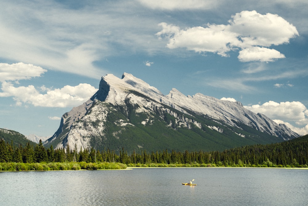 a lake with a mountain in the background