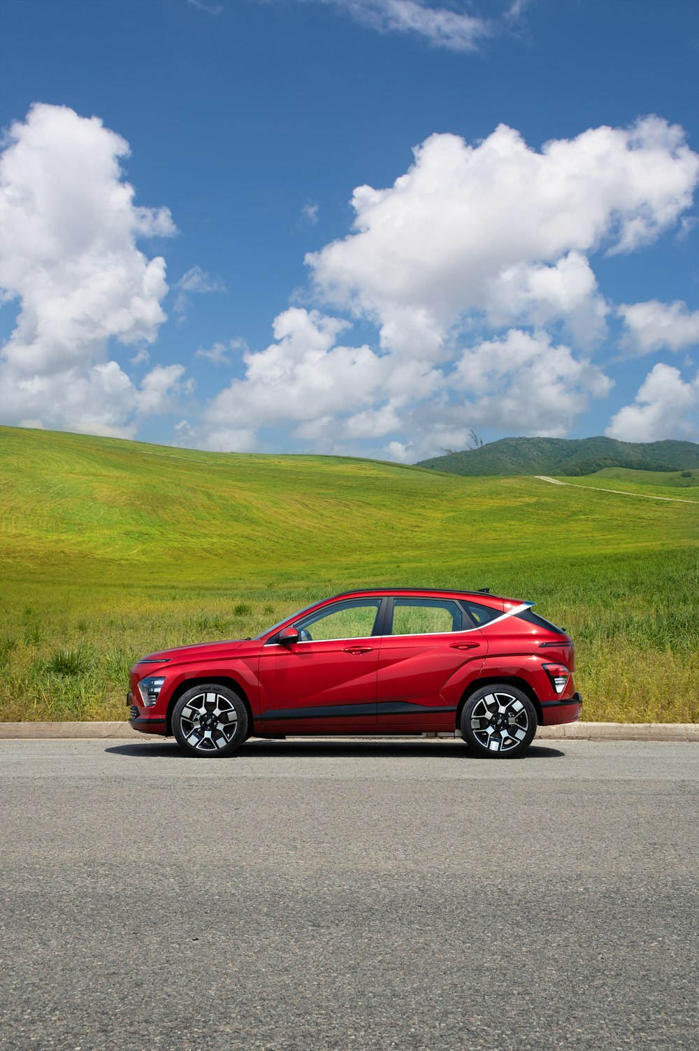 a red car parked on the side of the road