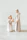 Artisan carefully carving intricate wooden figures for a traditional nativity set.