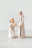 Artisan carefully carving intricate wooden figures for a traditional nativity set.