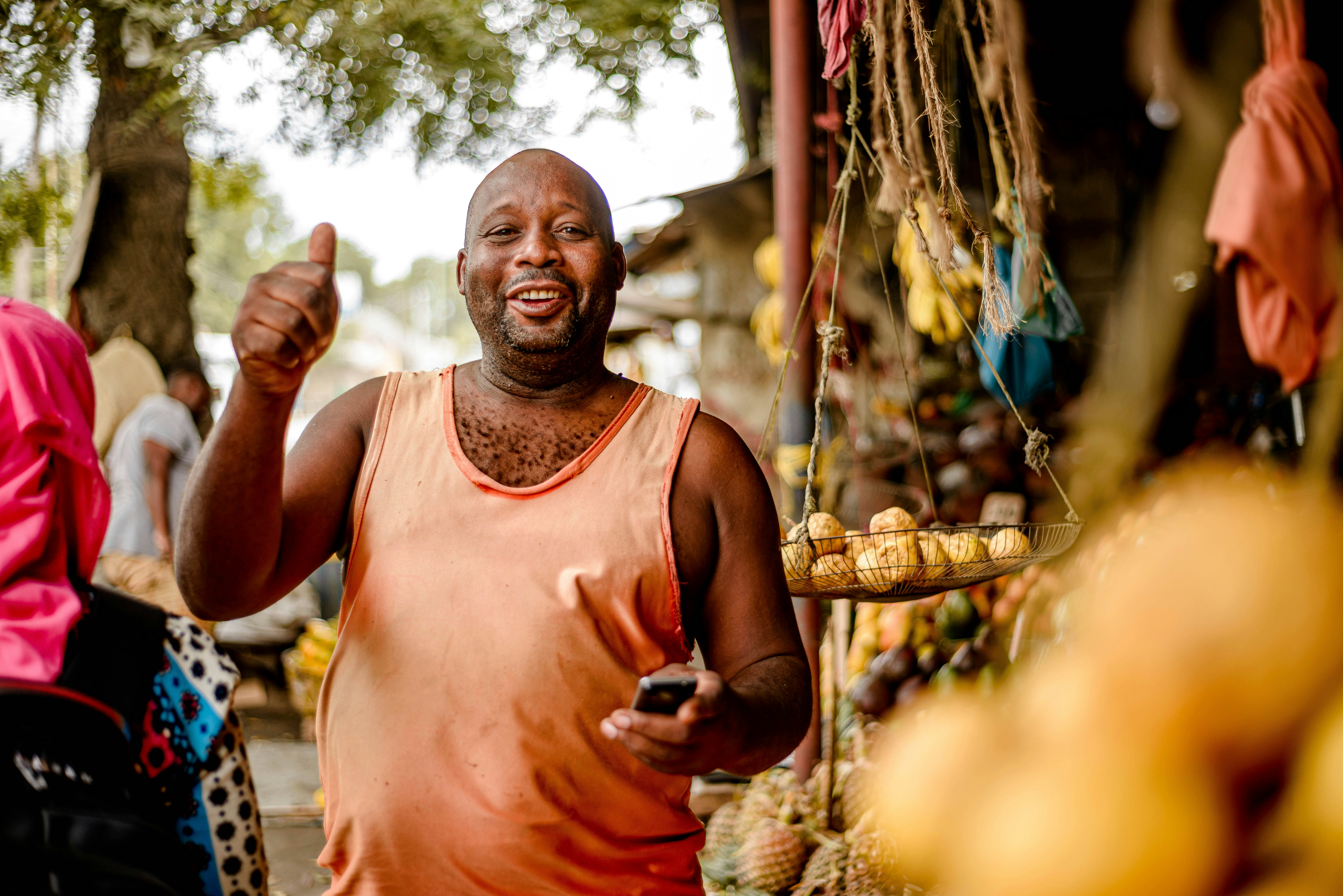 Fruit vendor with feature phone