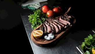 A sizzling cooked steak with juicy marbling on a rustic wooden board, steam rising gently.