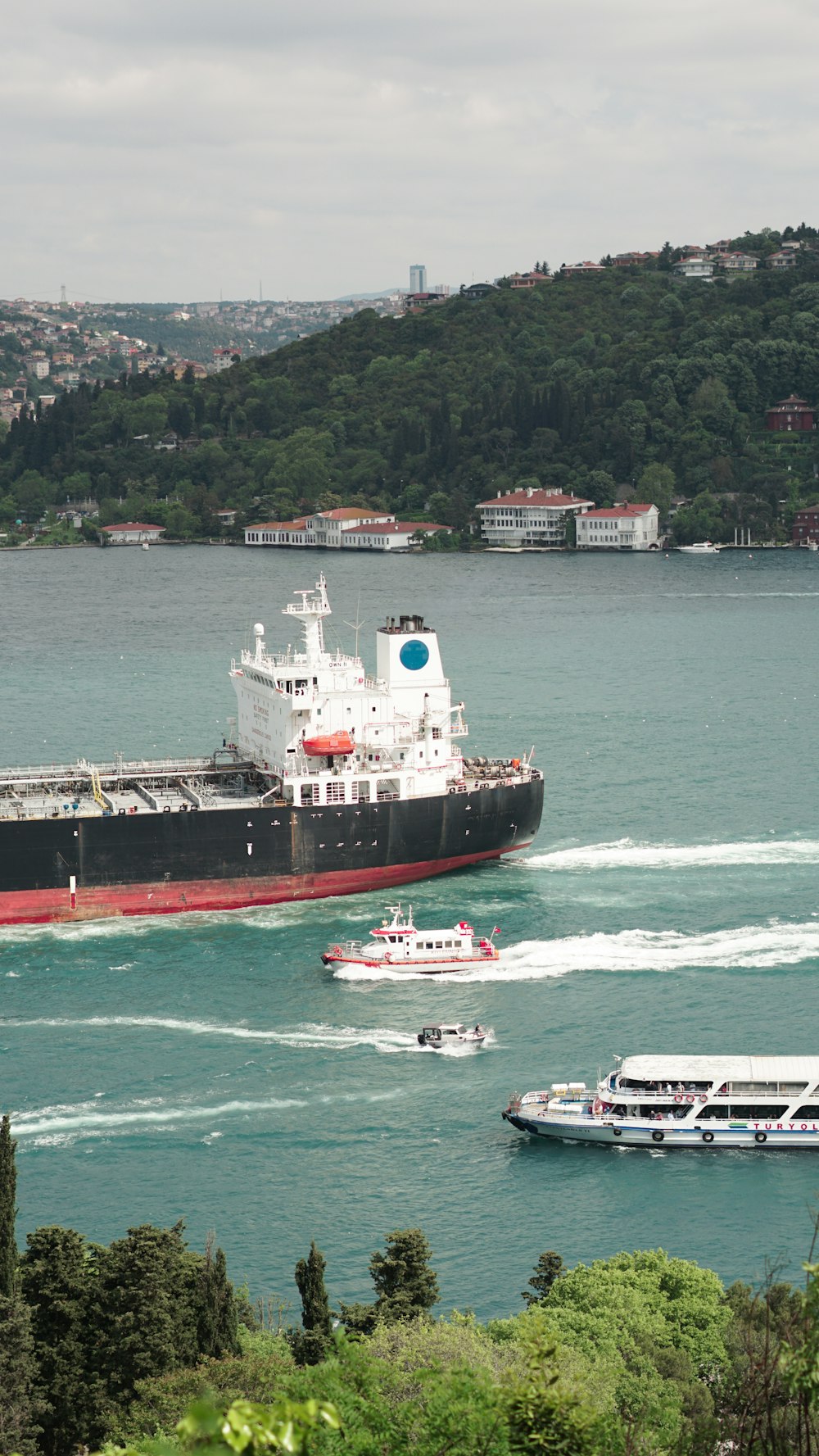 a large cargo ship in the middle of a body of water