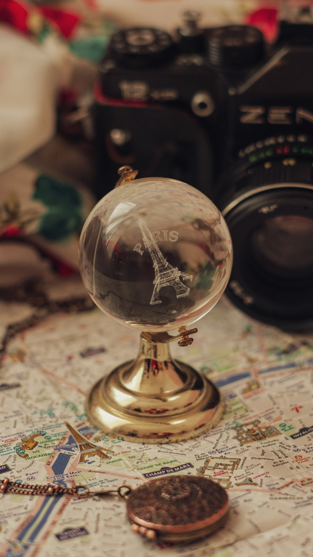 a camera and a map on a table