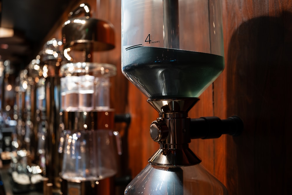 a coffee maker sitting on top of a wooden counter