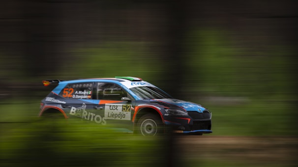 Action shot of a Raske Racing Team car crossing the finish line at Rahvaralli.