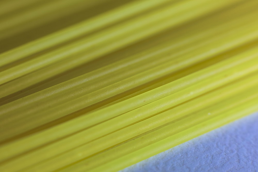 a close up of a yellow piece of paper