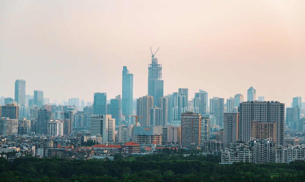 a view of a city with tall buildings