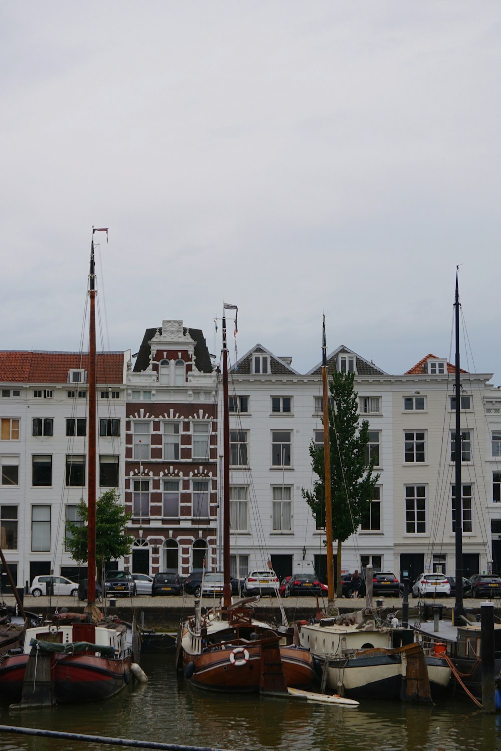 a group of boats that are sitting in the water