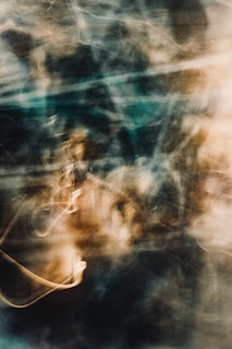 A gentle swirl of light and shadow forming an abstract, calming composition