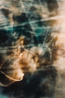 A gentle swirl of light and shadow forming an abstract, calming composition