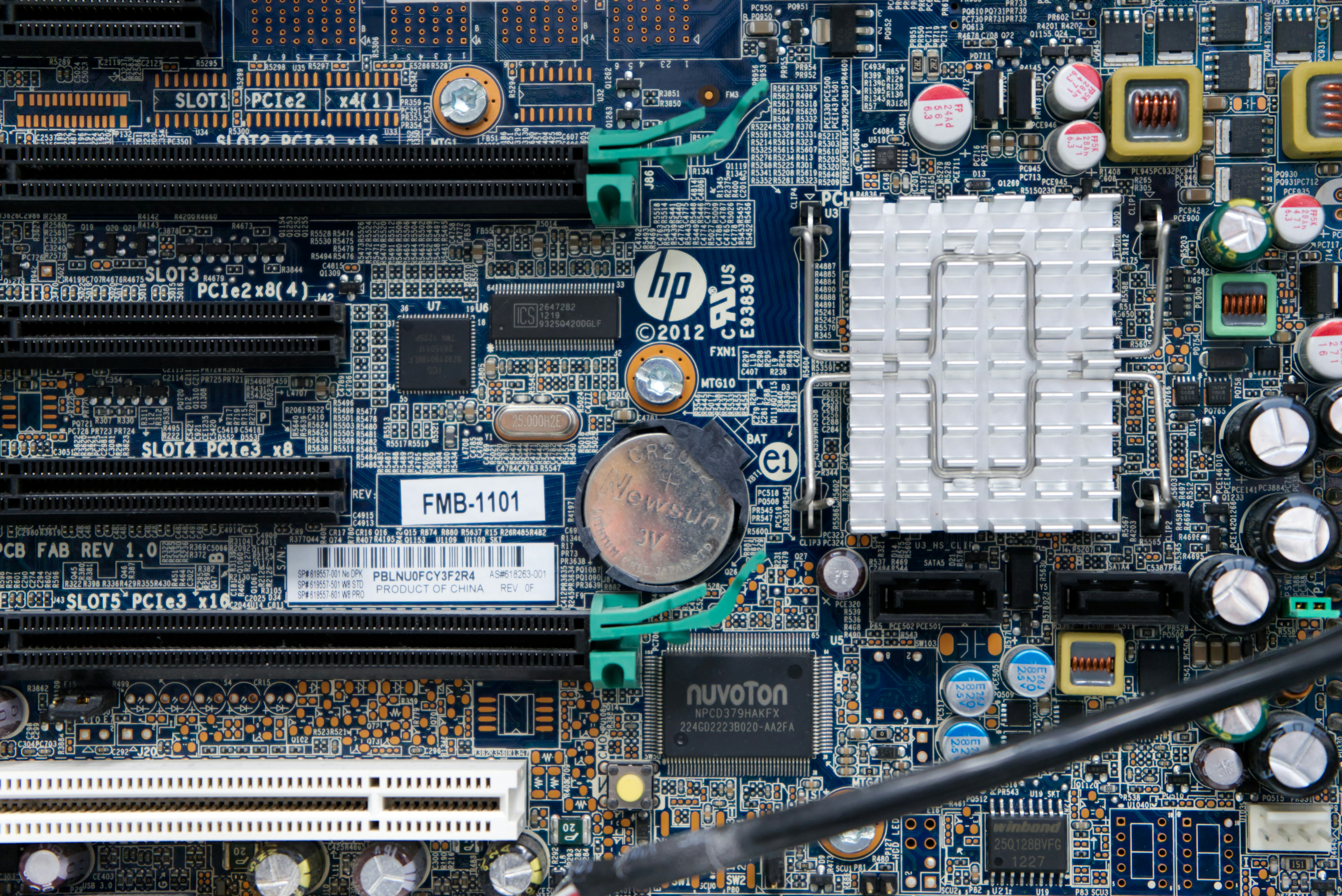a close up of a motherboard with a cpu chip