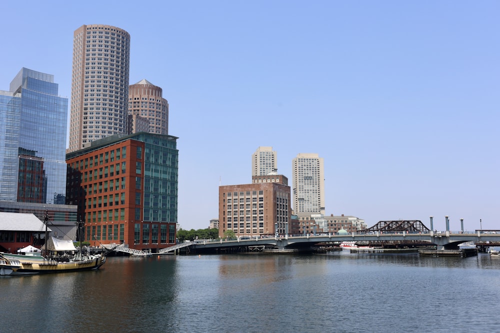 a body of water surrounded by tall buildings