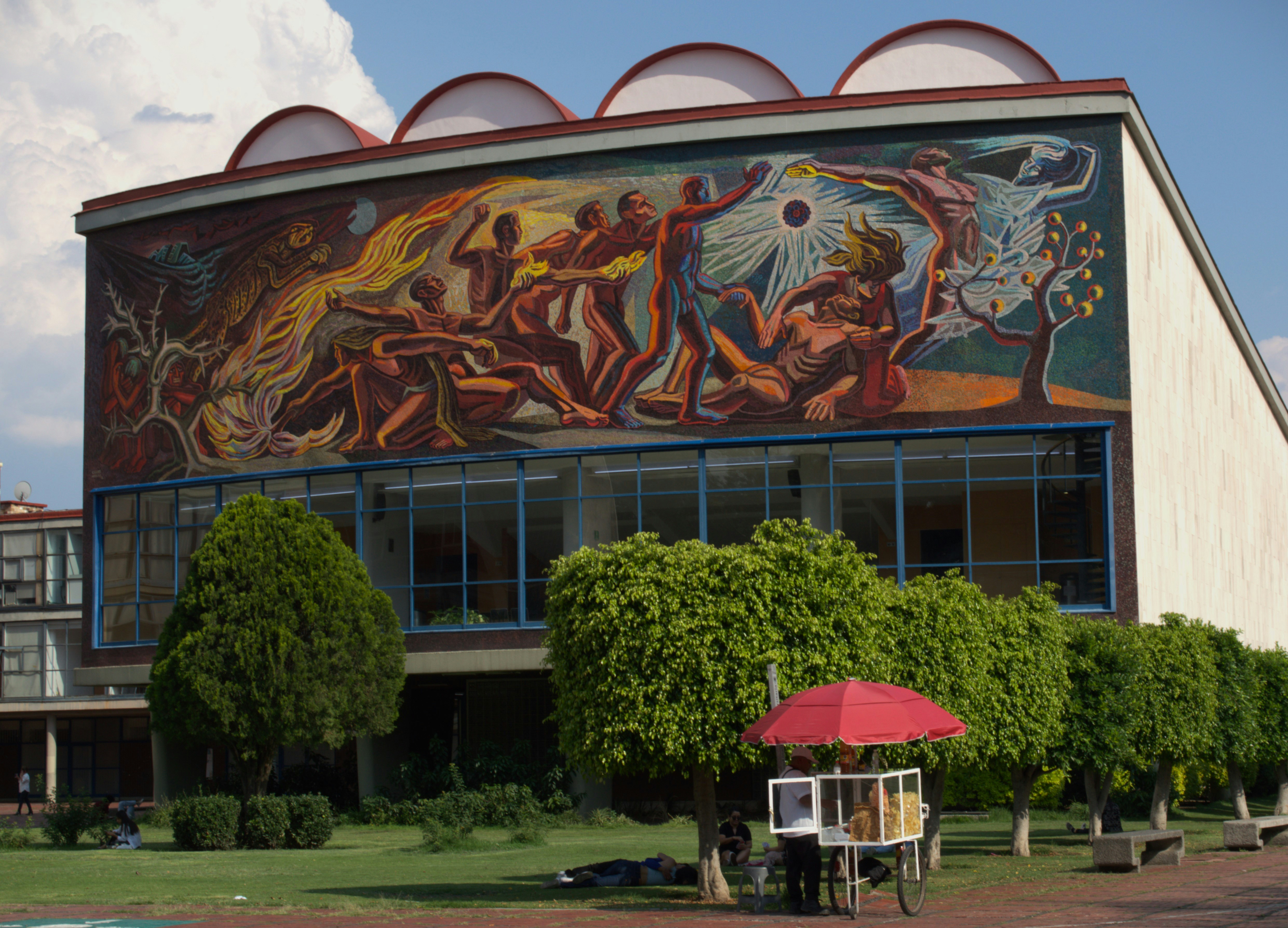 a large building with a mural on the side of it