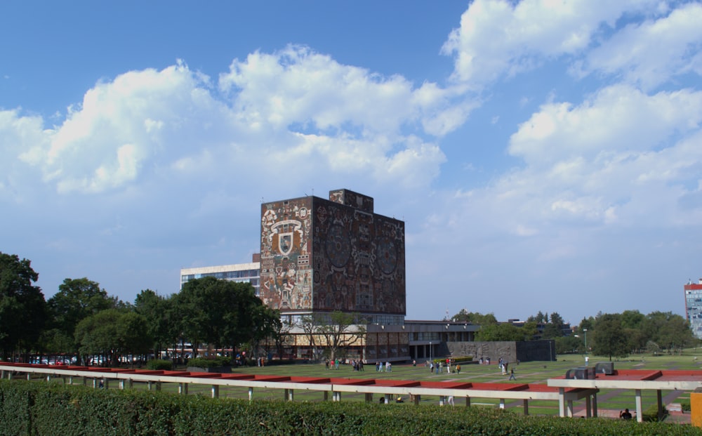 a tall building with a clock on the side of it