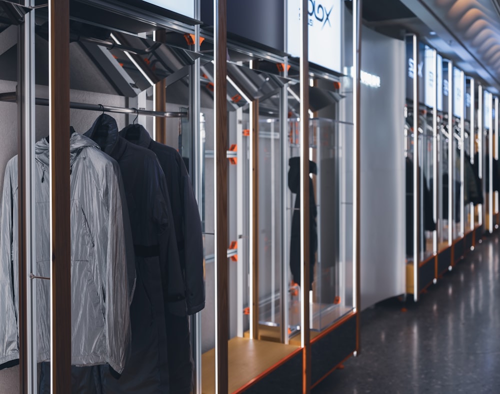 a row of clothing racks in a store