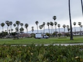 Mobile service van parked in a sunny Rancho Santa Fe neighborhood, ready for on-site repairs.