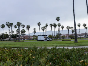 Prime Pest Control van parked outside a sunny Sebring neighborhood.