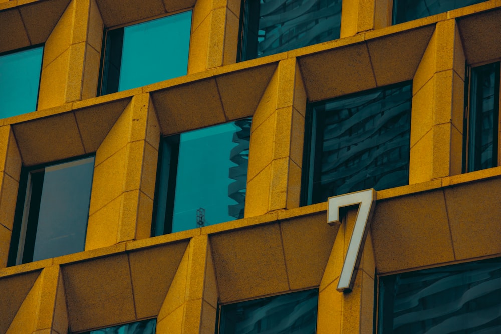 a close up of a clock on a building