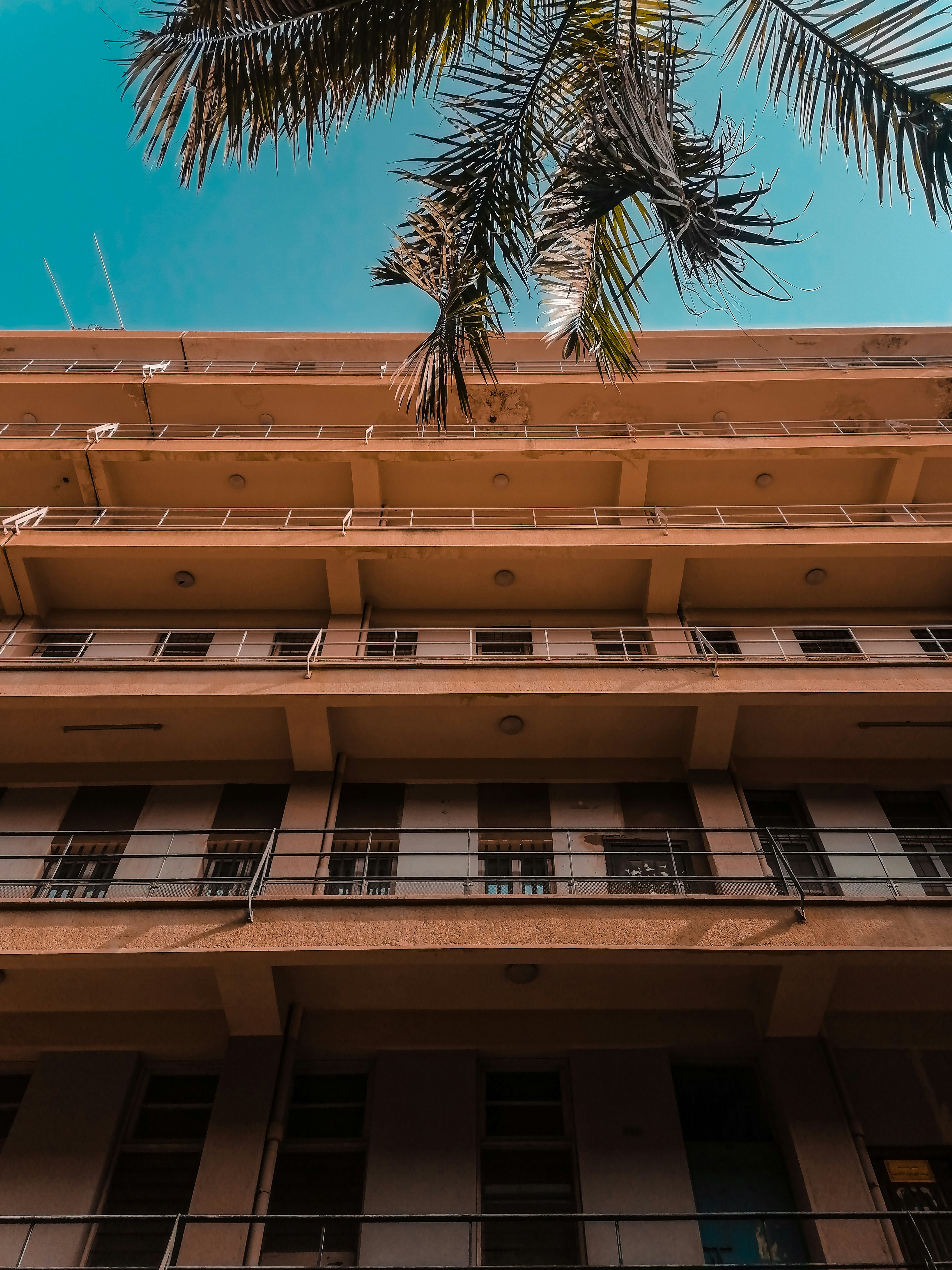 a tall building with balconies and balconies on it