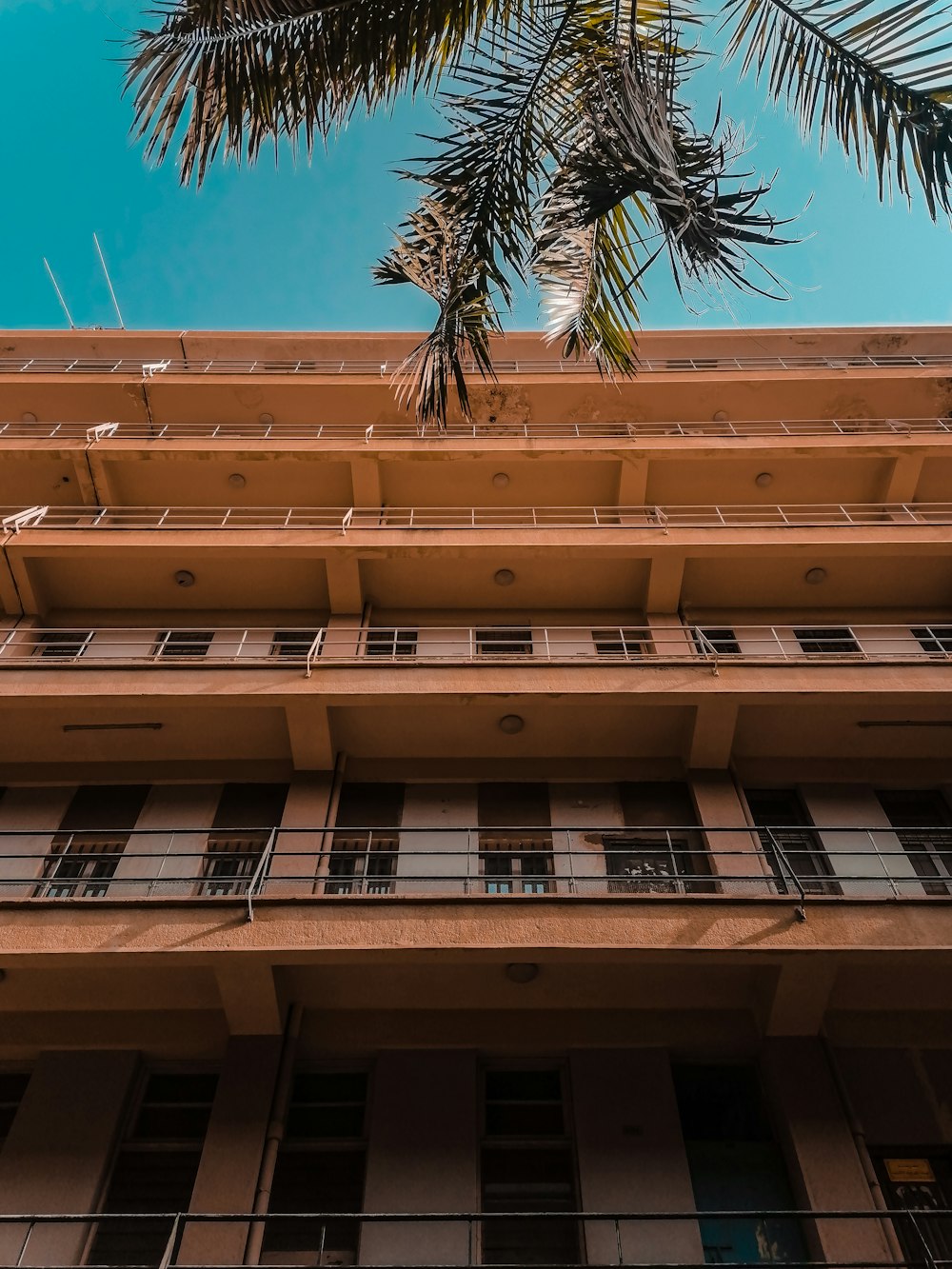 a tall building with balconies and balconies on it