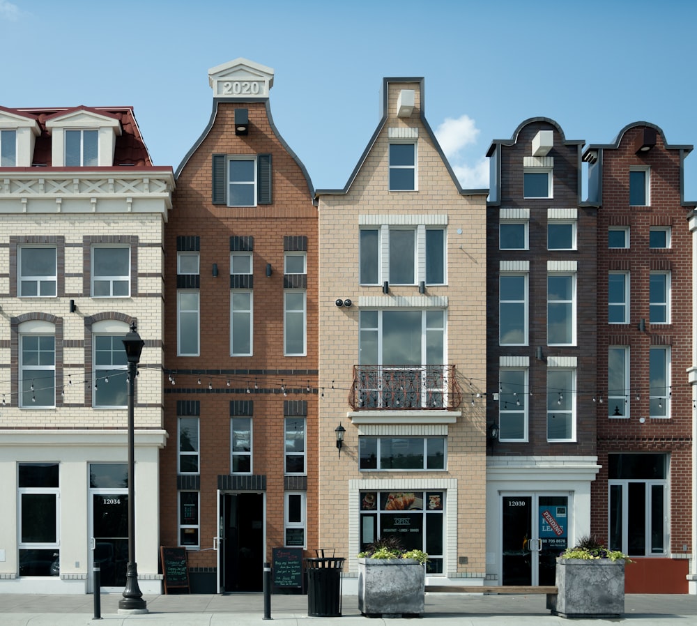 a row of brick buildings on a city street