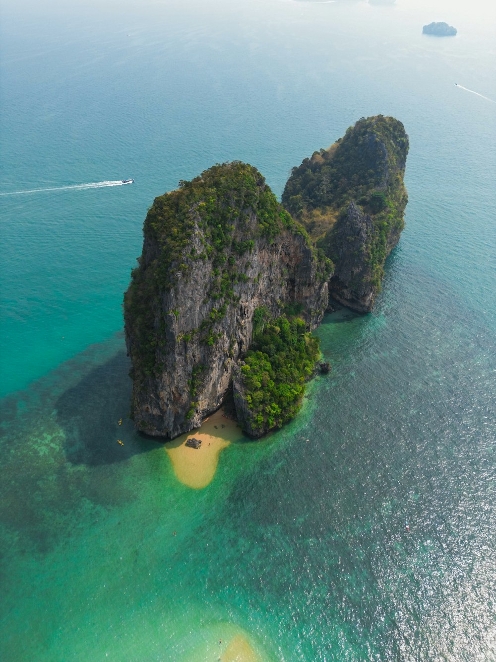 an aerial view of an island in the middle of the ocean