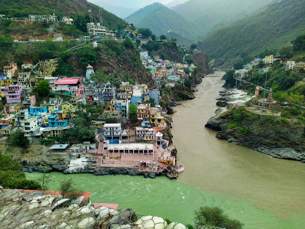 a river flowing through a lush green valley