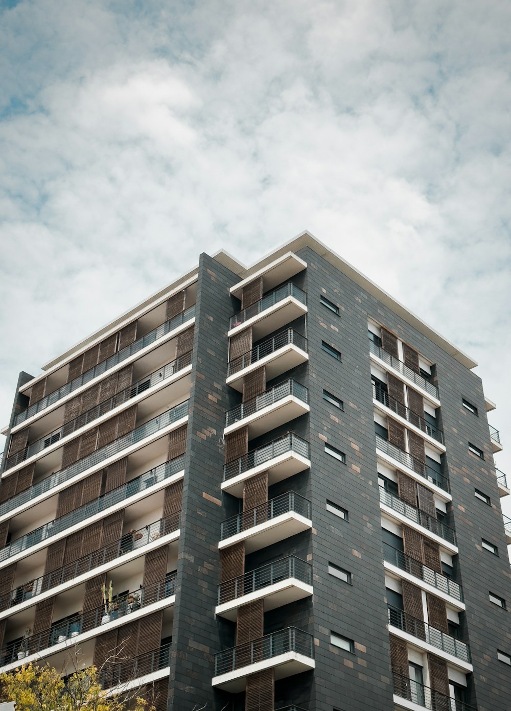 a tall building with balconies and balconies on the balconies