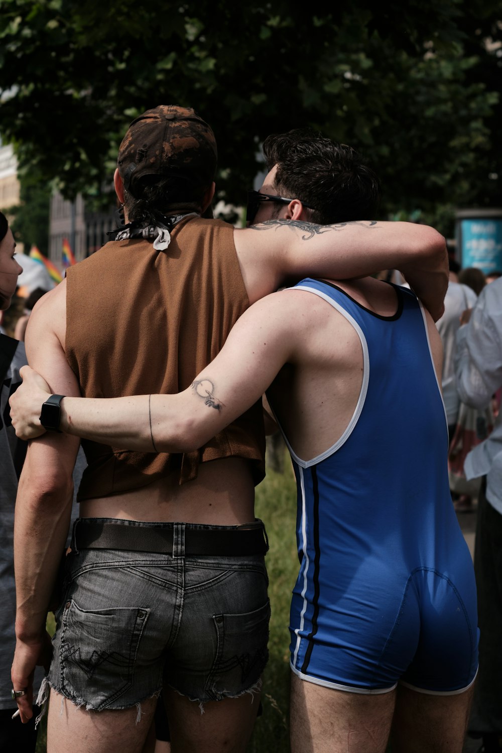 a couple of men standing next to each other