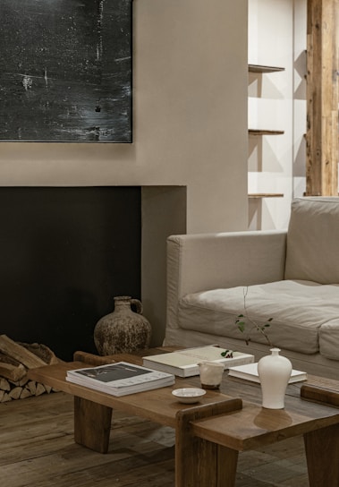 A cozy living room featuring a beautifully crafted wooden sofa and matching coffee table from weaboard furniture.