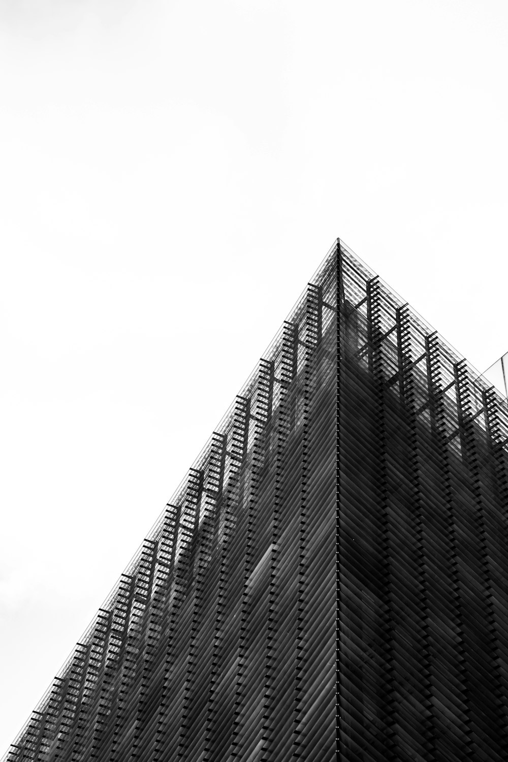 a black and white photo of a tall building