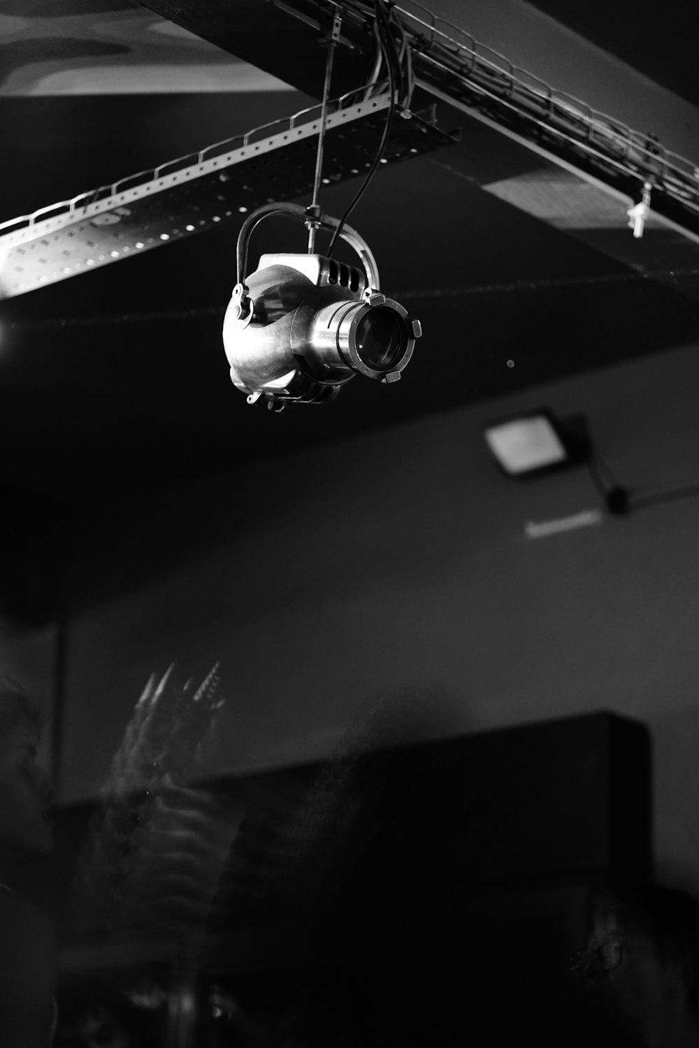 a black and white photo of a light fixture