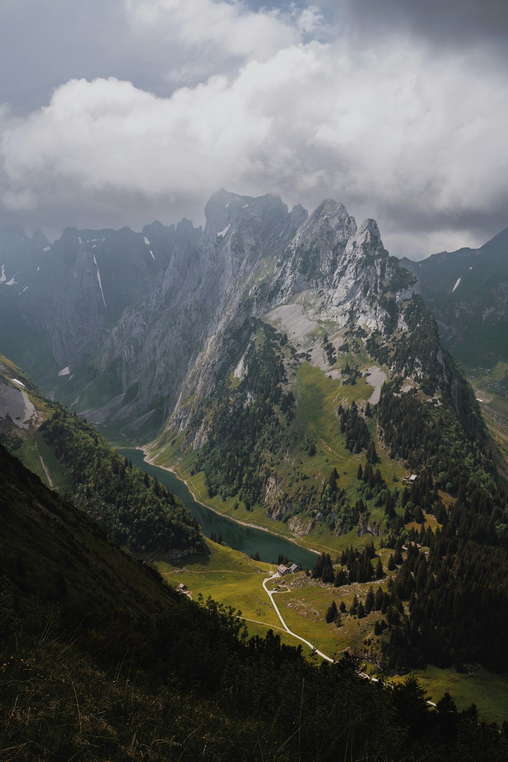 a view of a mountain range with a river running through it