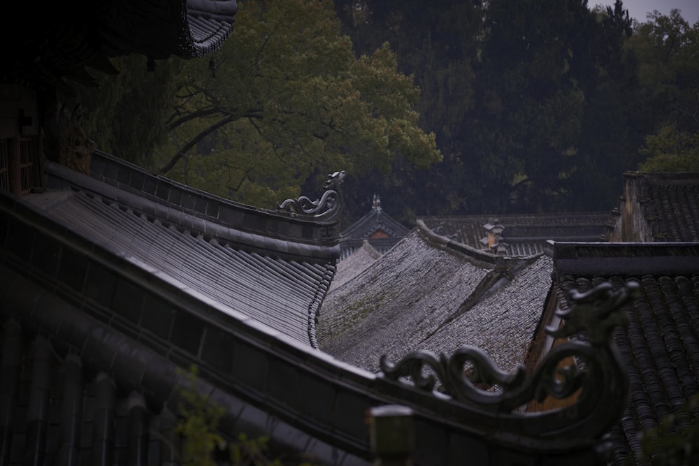 a view of the roof of a building in the rain