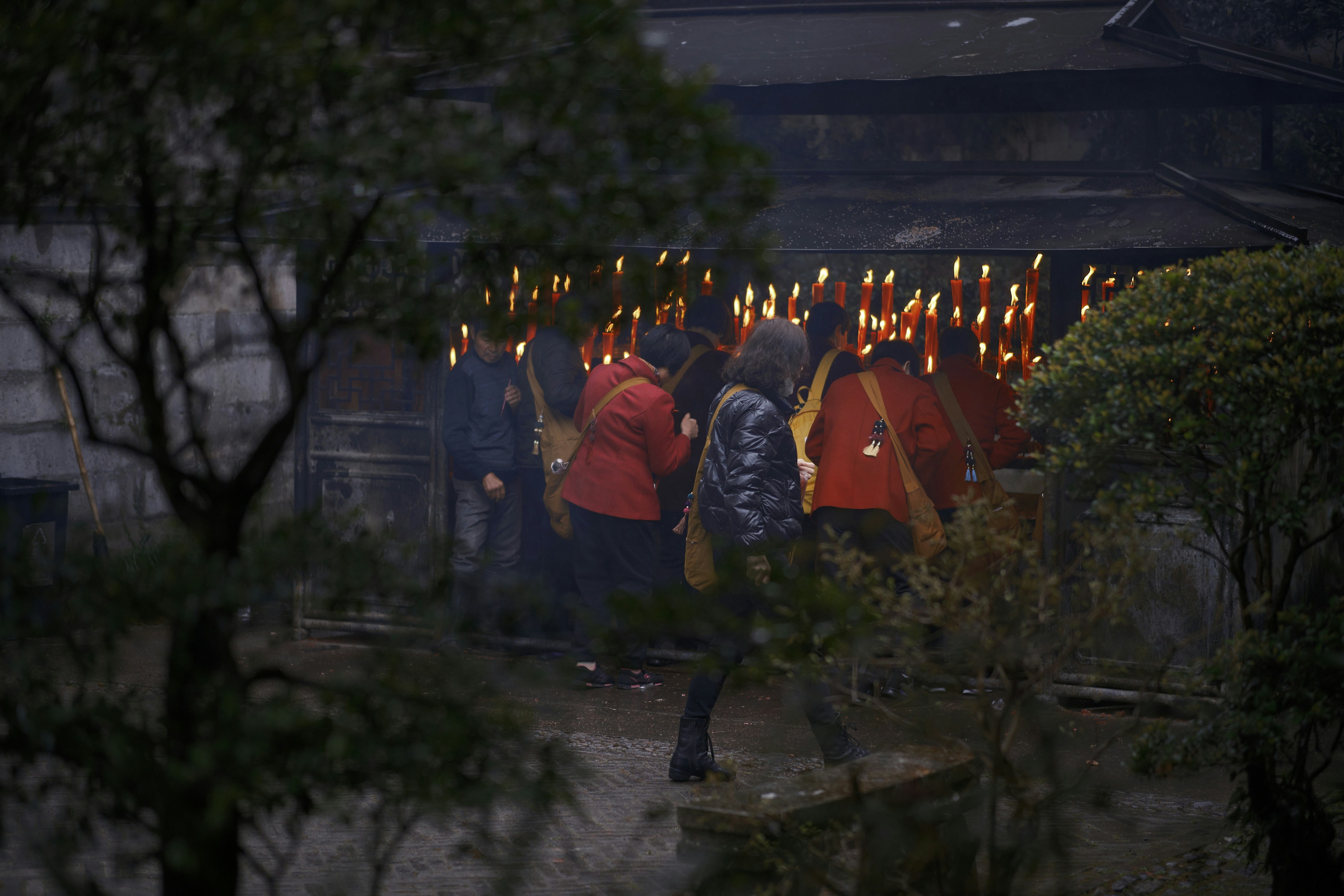 a group of people standing next to each other