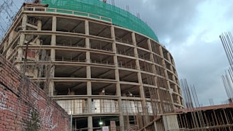 a building under construction with scaffolding around it