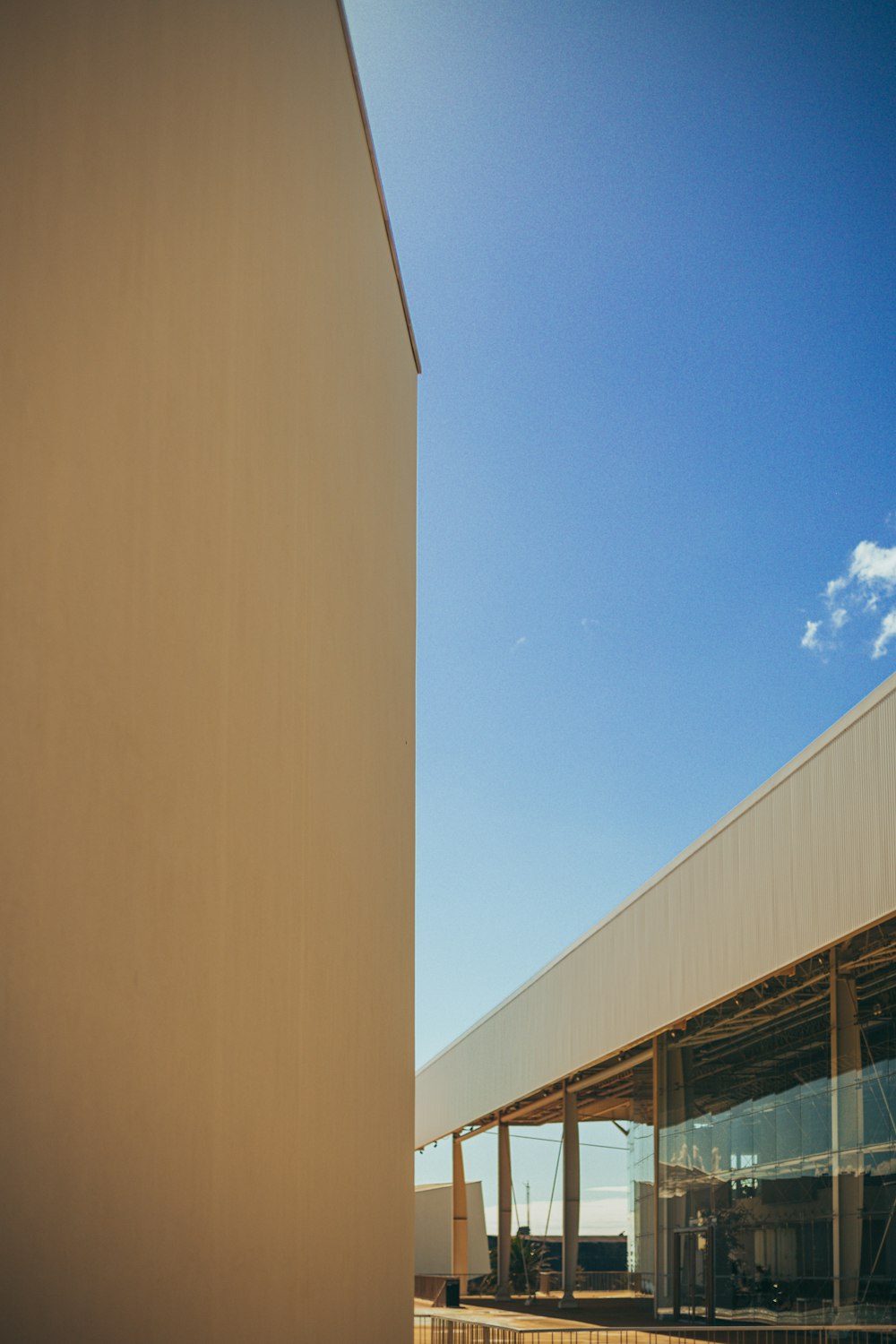 a tall building with a sky in the background