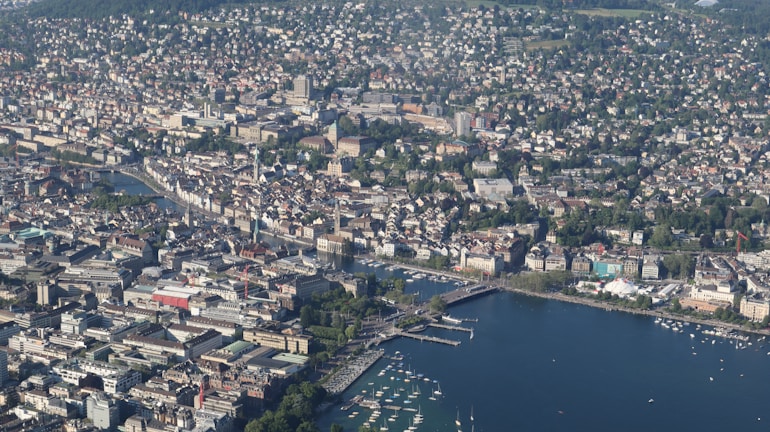 an aerial view of a city and a harbor