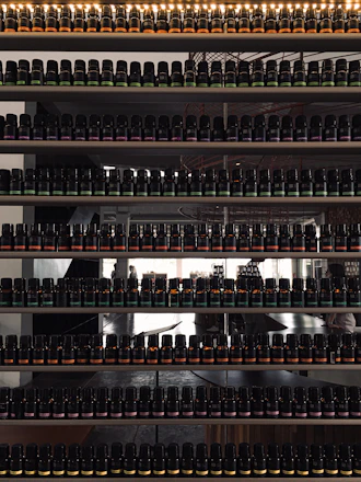 a shelf filled with lots of bottles of wine