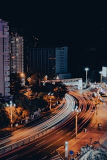 A vibrant cityscape with electric vehicles in motion.