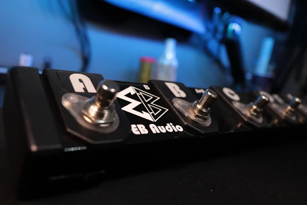 The bim-w1 system displayed on a pedalboard setup, blending seamlessly with other premium music gear.