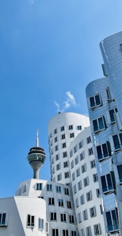 City skyline with connected digital network lines symbolizing technology integration.