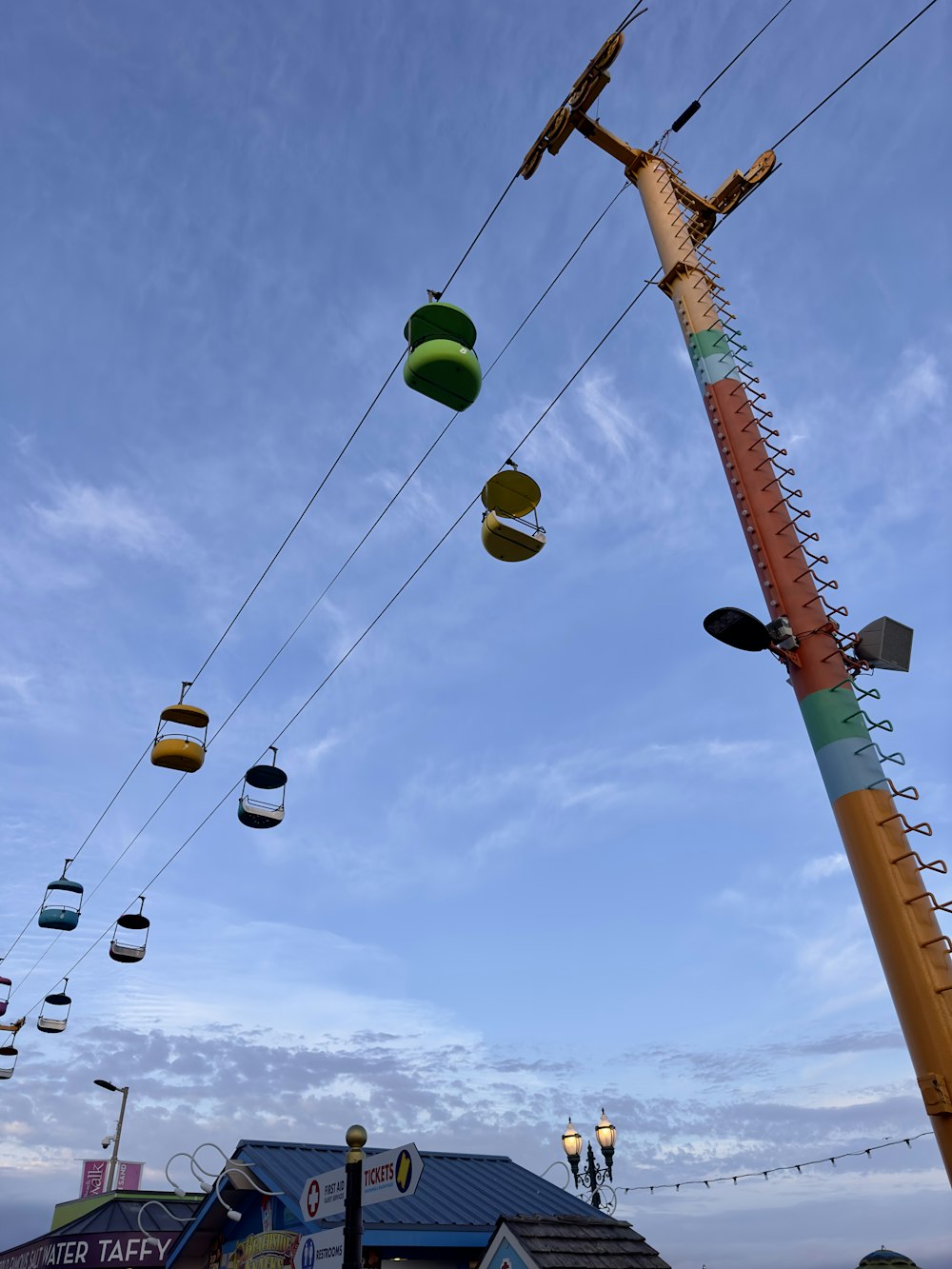 a bunch of wires that are hanging from a pole