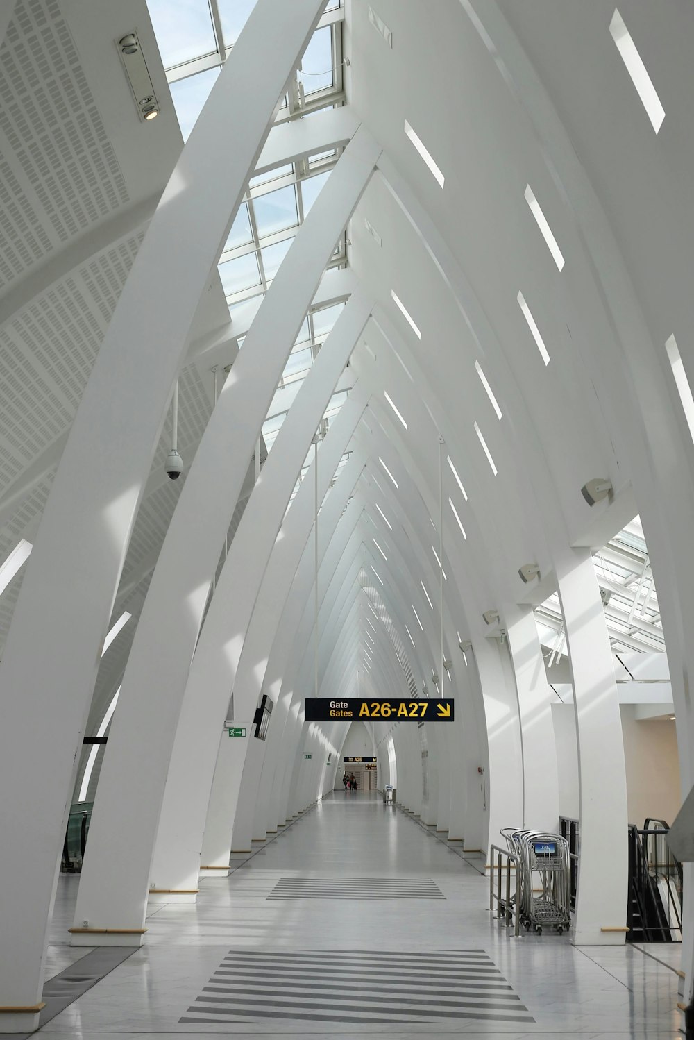 a large white building with a skylight above it