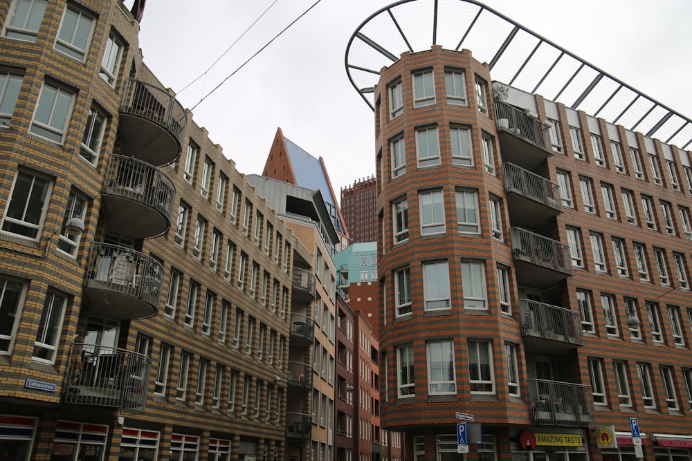 a group of tall buildings next to each other