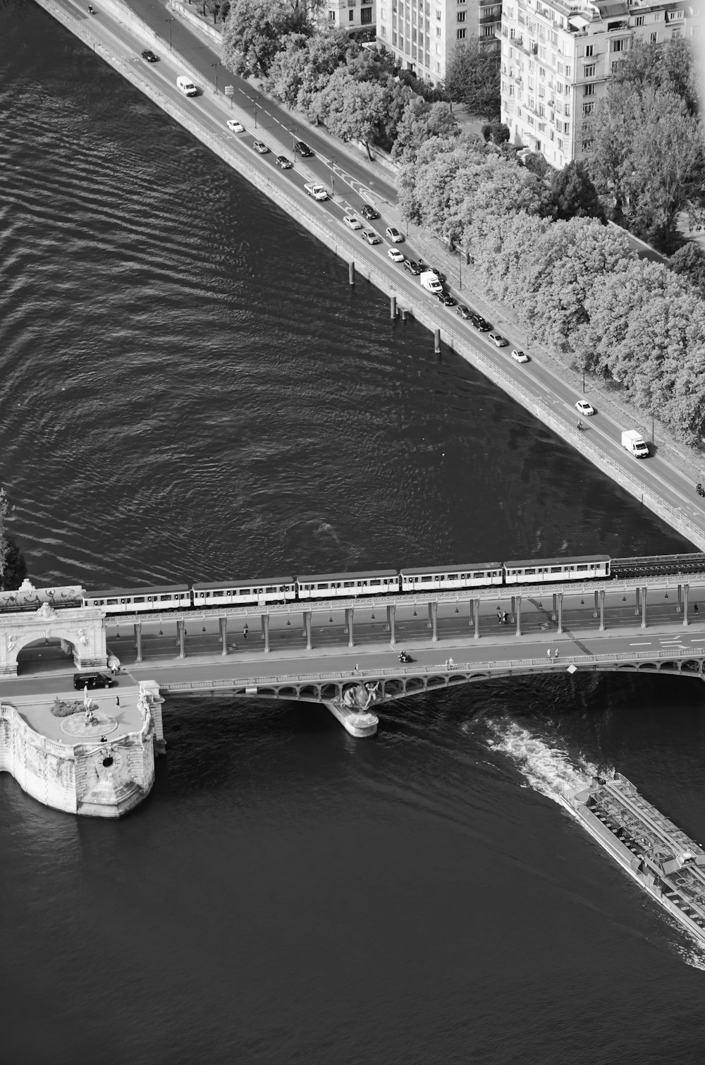 a train crossing a bridge over a river