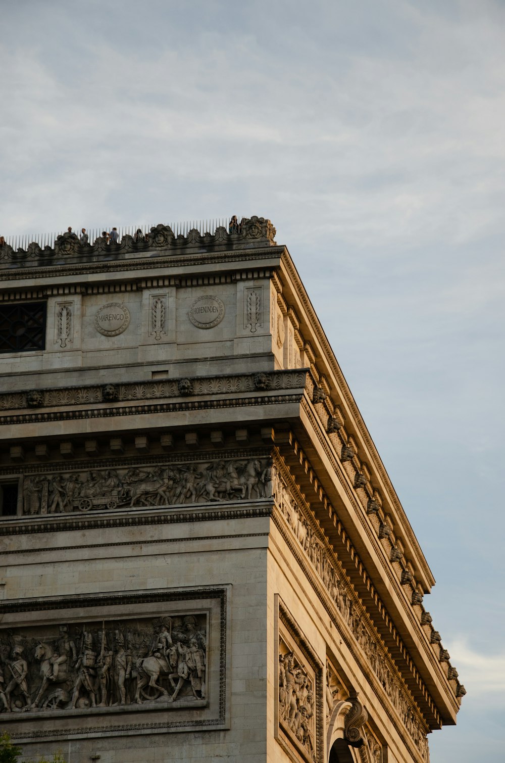 a tall tower with a clock on the top of it